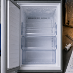 Réparation congélateur : diagnostic pannes, congélateur ouvert avec givre et ventilation humide